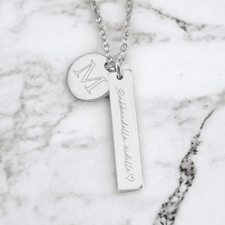 Koru kaiverruksella, hopeanvärinen